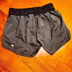 Lululemon Women's Size 8 Lined Running Tracker Shorts Black Logo Athletic